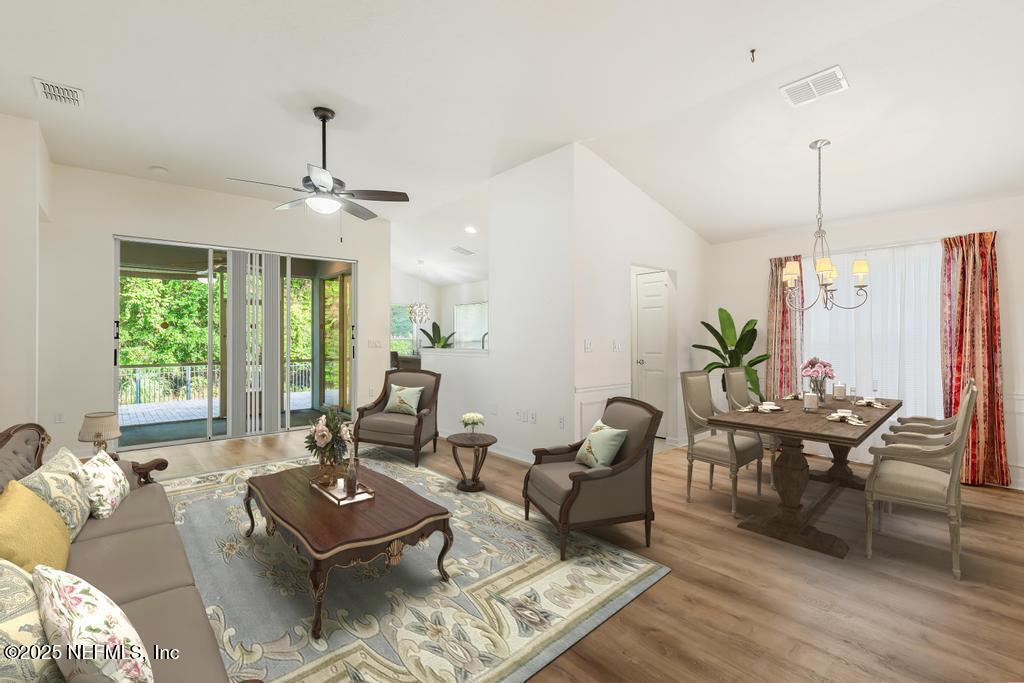 9080 Sweet Tree Trail Jacksonville, FL 32256 - Photo 3 of 44 a living room with furniture and wooden floor