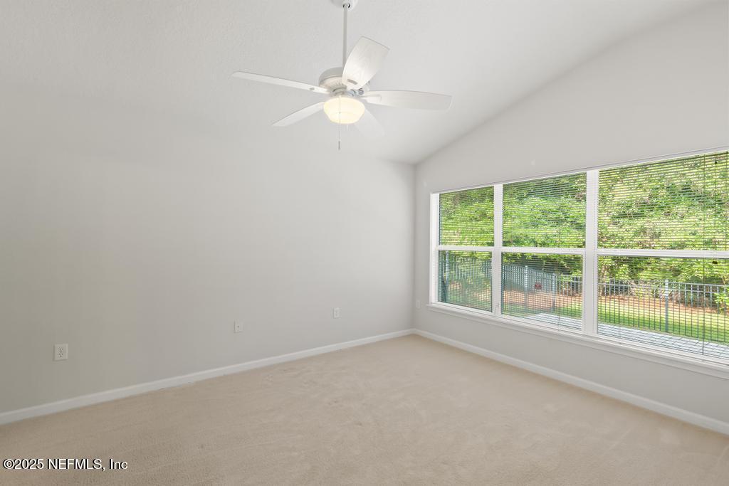 9080 Sweet Tree Trail Jacksonville, FL 32256 - Photo 32 of 44 a view of a room with a large window