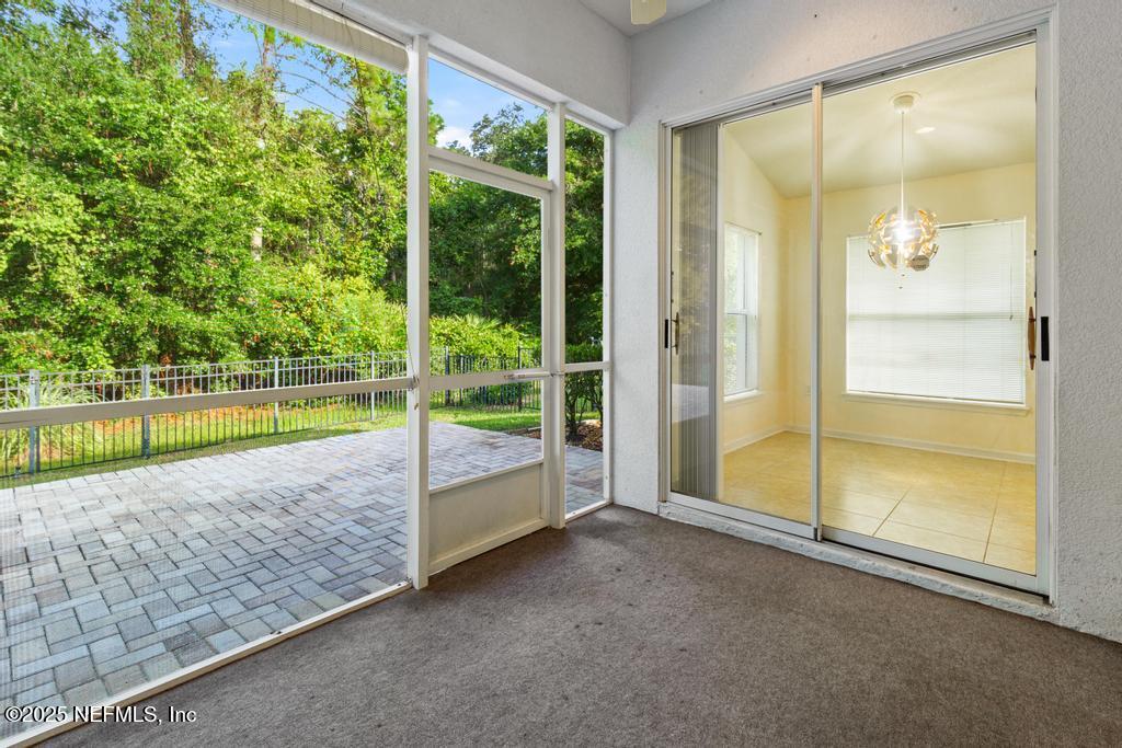 9080 Sweet Tree Trail Jacksonville, FL 32256 - Photo 36 of 44 a view of a room with swimming pool and window