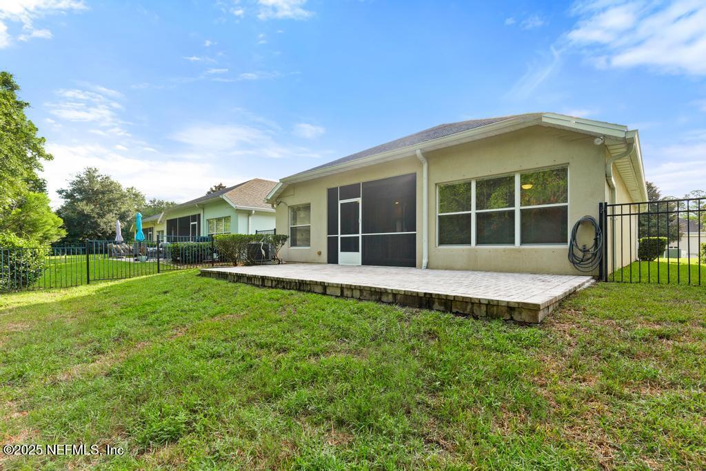 9080 Sweet Tree Trail Jacksonville, FL 32256 - Photo 42 of 44 a view of a house with backyard and porch