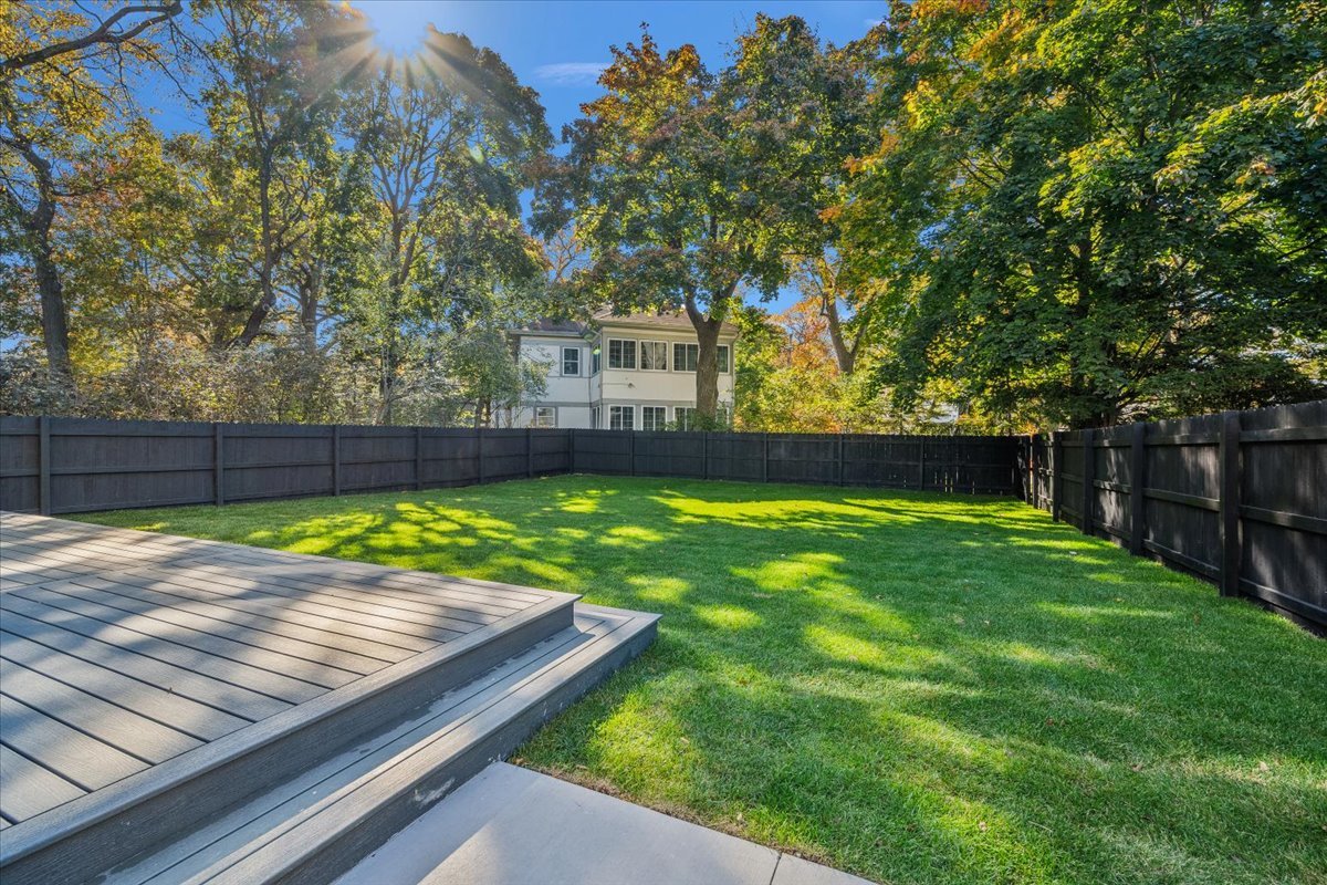 849 Sheridan Road Wilmette, IL 60091 - Photo 19 of 73 a view of a backyard with wooden fence