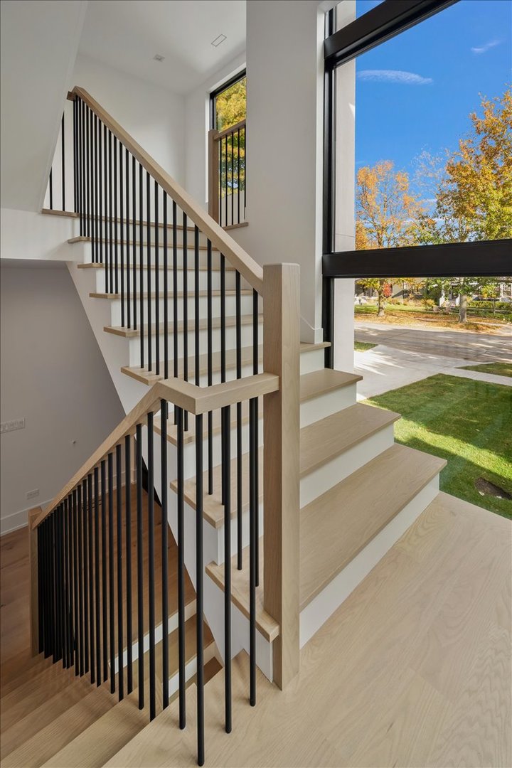 849 Sheridan Road Wilmette, IL 60091 - Photo 52 of 73 a view of a balcony with floor to ceiling windows with wooden floor