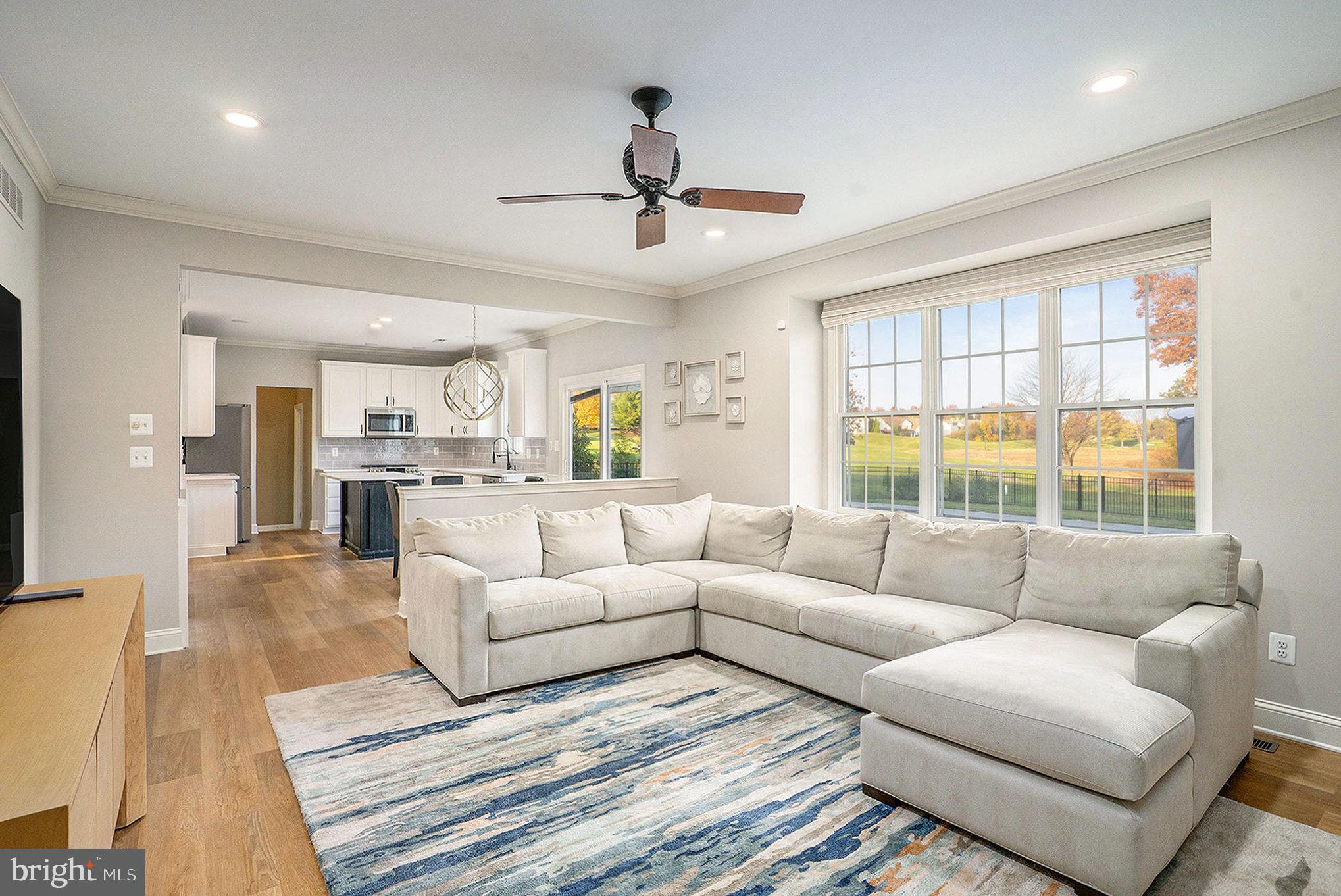 127 Spyglass Drive Blue Bell, PA 19422 - Photo 16 of 74 a living room with furniture and a large window