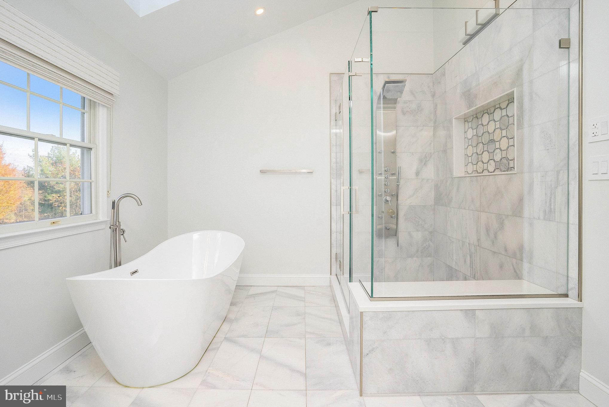 127 Spyglass Drive Blue Bell, PA 19422 - Photo 25 of 74 a bathroom with a bathtub and shower