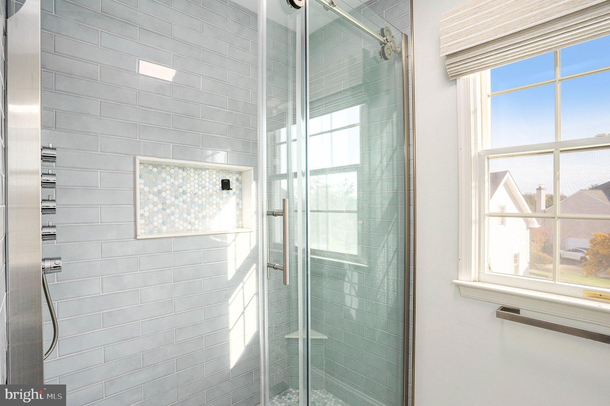 127 Spyglass Drive Blue Bell, PA 19422 - Photo 31 of 74 a bathroom with a glass shower door