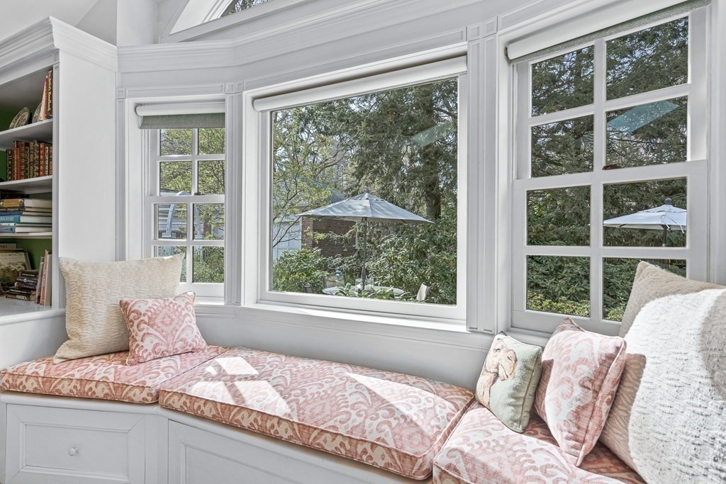 218 Middlesex Road Brookline, MA 02467 - Photo 15 of 30 a bed sitting in front of a window