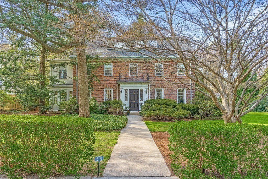 218 Middlesex Road Brookline, MA 02467 - Photo 4 of 30 front view of a brick house with a yard