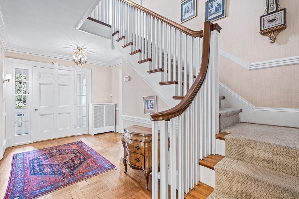 218 Middlesex Road Brookline, MA 02467 - Photo 5 of 30 a view of entryway bedroom and hall with wooden floor
