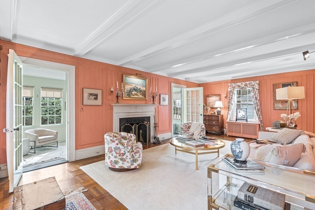 218 Middlesex Road Brookline, MA 02467 - Photo 8 of 30 a living room with fireplace furniture and a large window