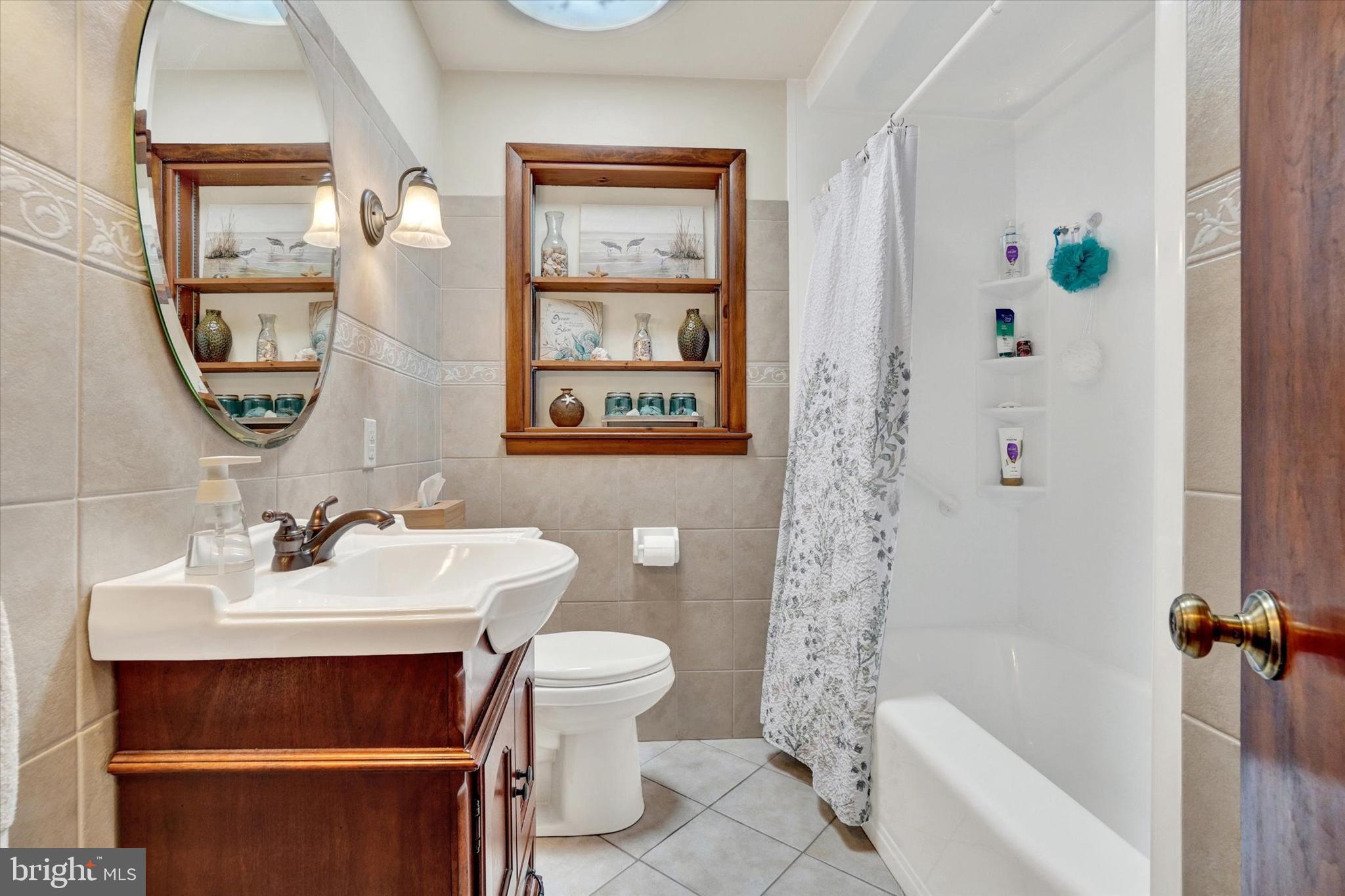 285 South Main Street Mount Wolf, PA 17347 - Photo 21 of 34 a bathroom with a sink toilet and shower