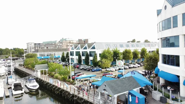 a view of city from terrace with seating space