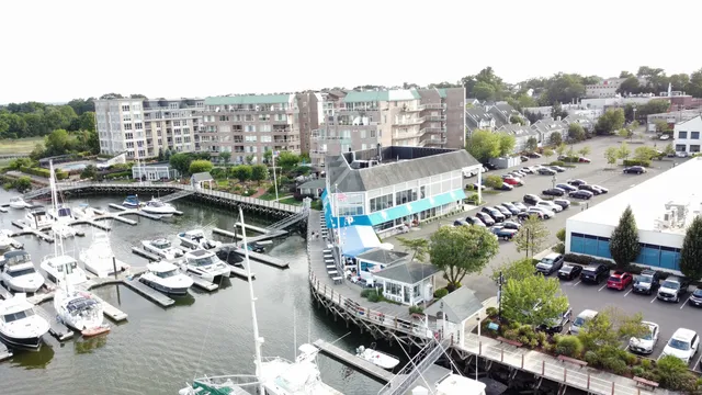 a view of city from balcony with outdoor seating