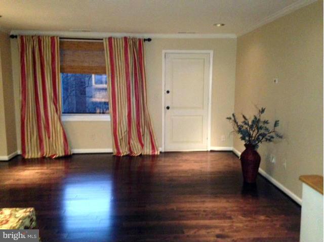 10 Cross Keys Road Baltimore, MD 21210 - Photo 8 of 14 a view of a room with wooden floor and closet