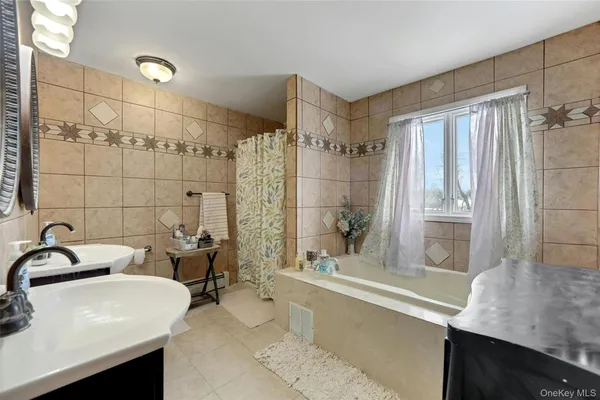 a bathroom with a sink and a bathtub