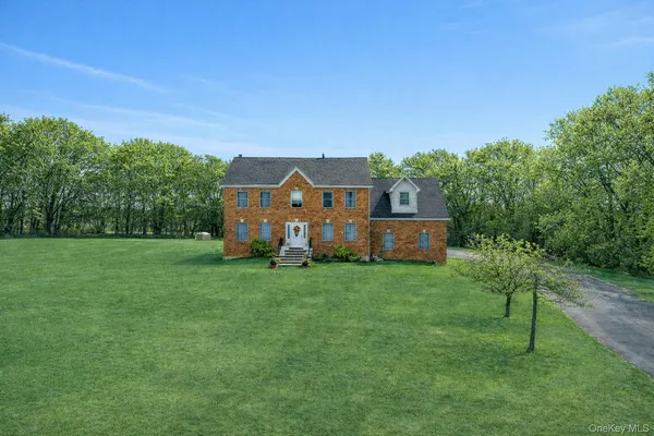 a house view with a garden space