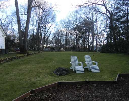 30 Point O Woods Road Darien, CT 06820 - Photo 15 of 16 a view of a park with large trees