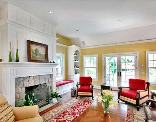 30 Point O Woods Road Darien, CT 06820 - Photo 4 of 16 a living room with furniture fireplace and a large window