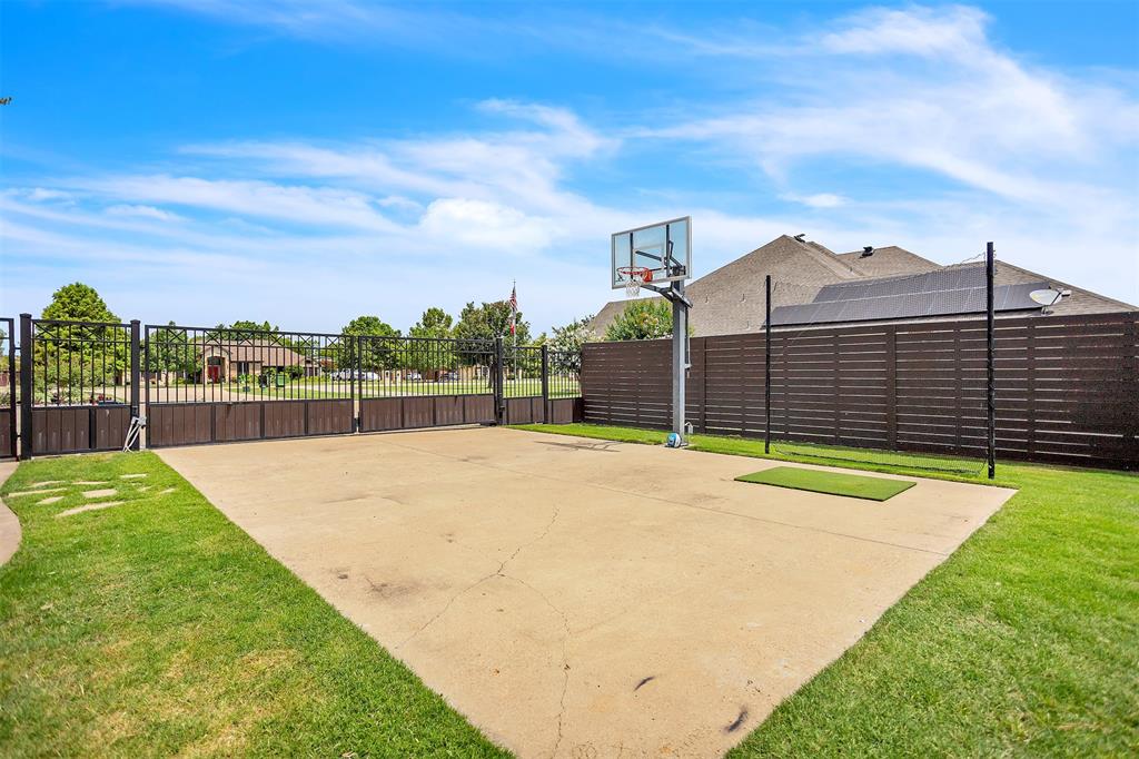 12286 Emerald Ranch Lane North Forney, TX 75126 - Photo 37 of 40 Extra concrete pad with basketball goal
