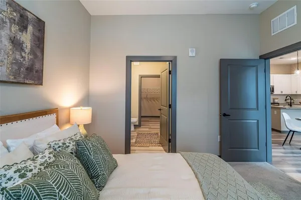 a patio with table and chairs