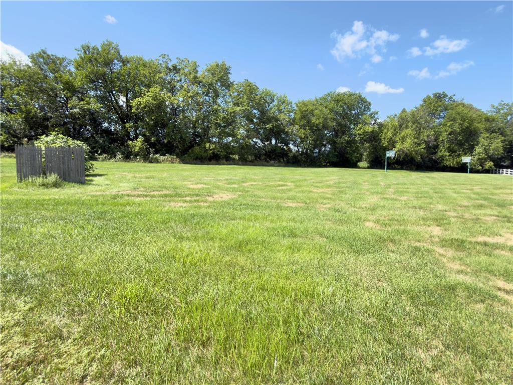 4982 Abbey Road Coplay, PA 18037 - Photo 55 of 55 Mature trees frame a wide grassy lawn under blue skies.
