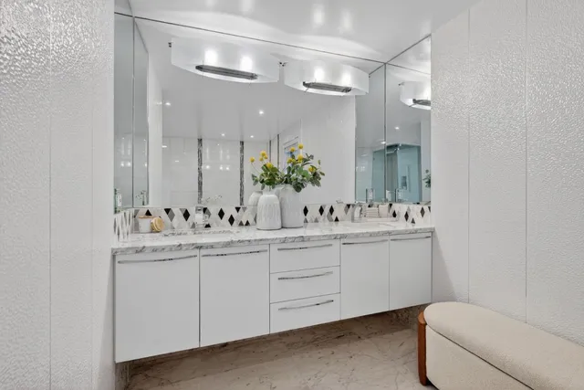 a bedroom with a bed and a desk