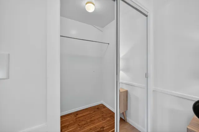 a view of balcony with furniture