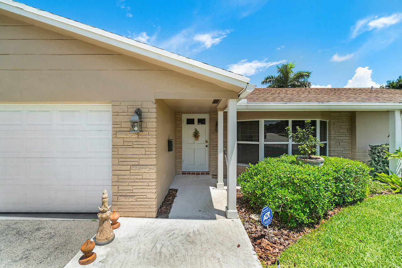 1300 Southwest 14th Avenue Boca Raton, FL 33486 - Photo 3 of 33 Covered Entrance