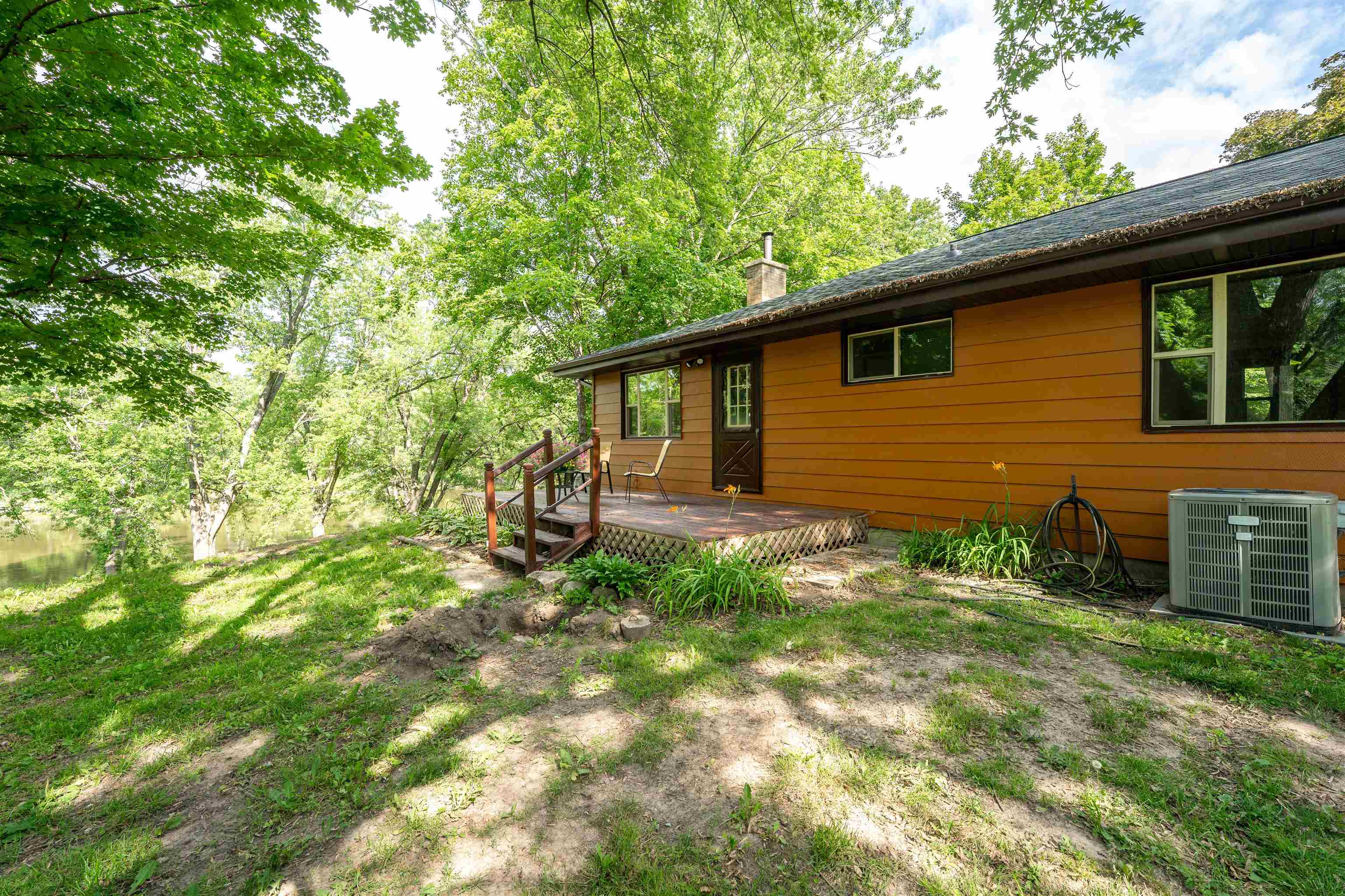 1162 South Bradley Road Oregon, IL 61061 - Photo 12 of 78 a backyard of a house with seating space