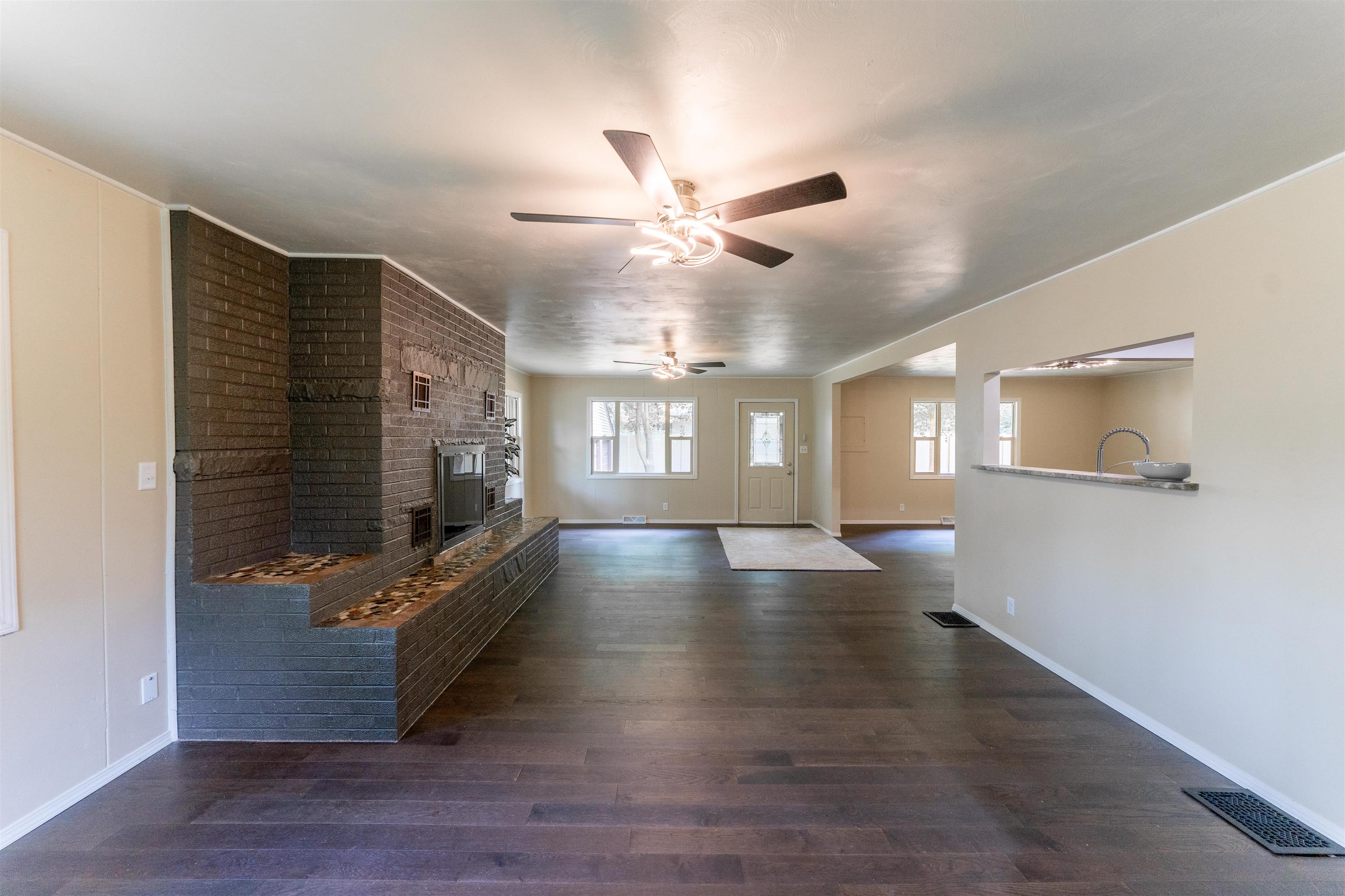 1162 South Bradley Road Oregon, IL 61061 - Photo 17 of 78 a view of an empty room with window and wooden floor