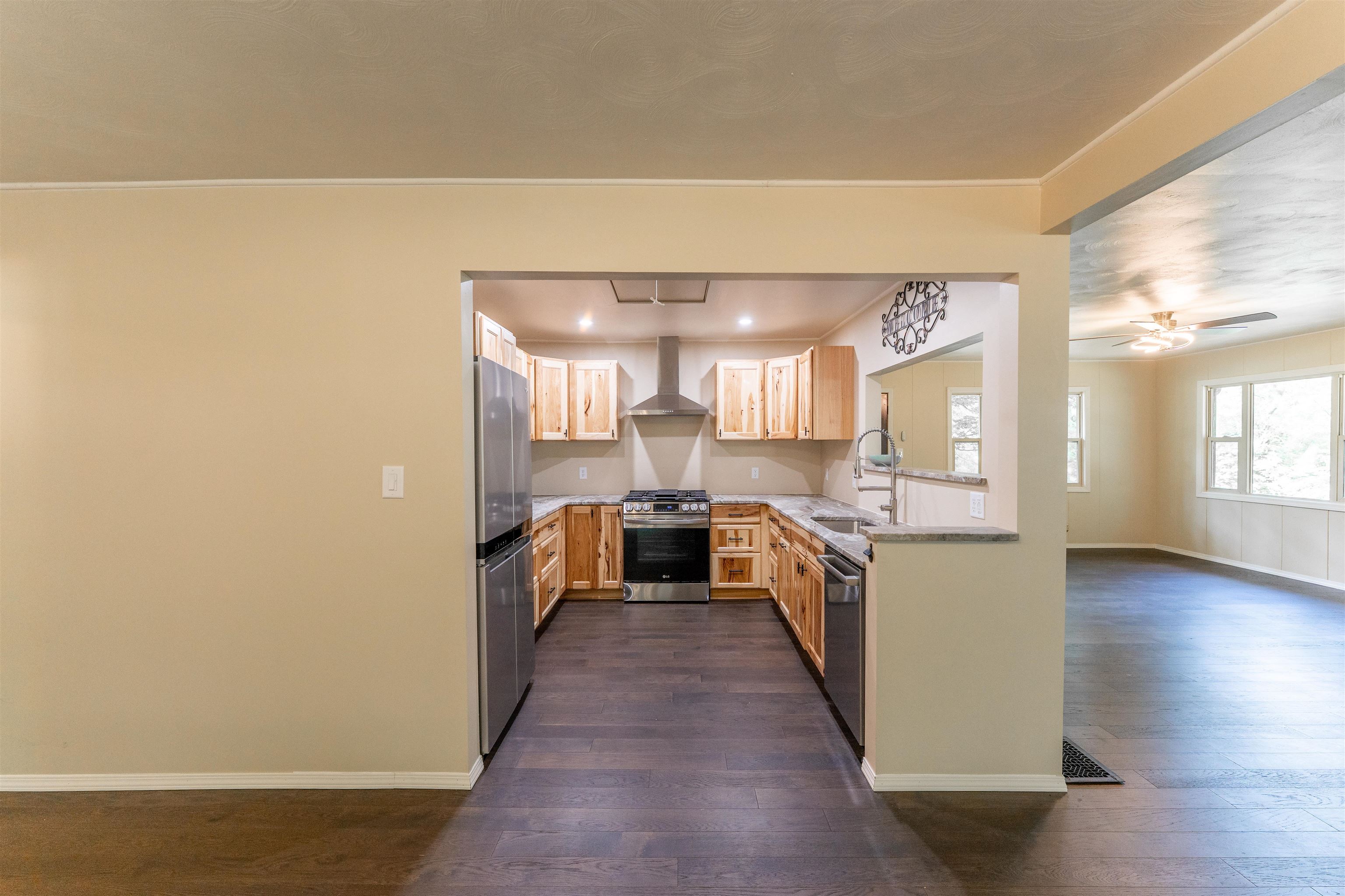 1162 South Bradley Road Oregon, IL 61061 - Photo 18 of 78 a large kitchen with a large counter top space a sink and stainless steel appliances