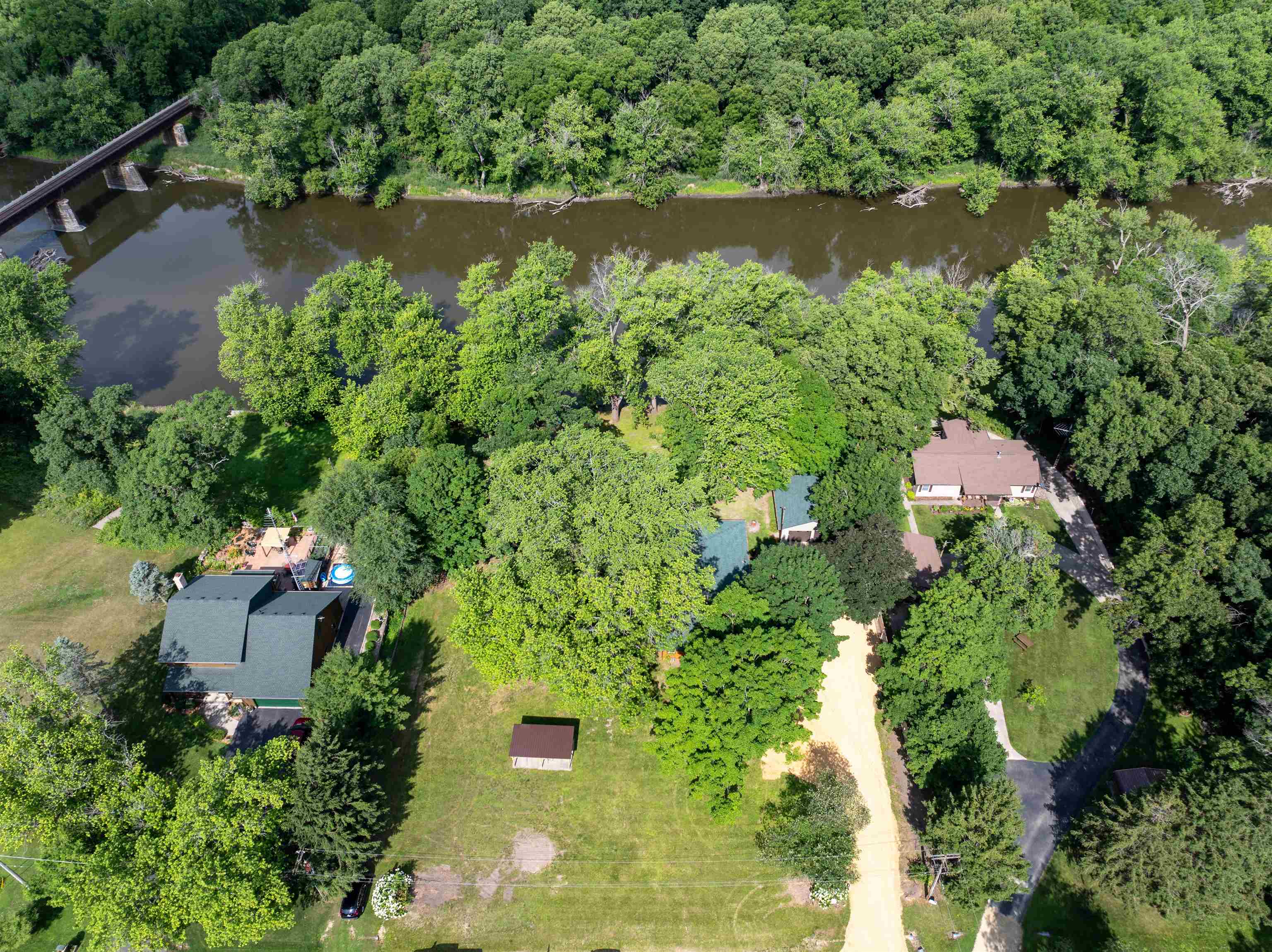 1162 South Bradley Road Oregon, IL 61061 - Photo 2 of 78 an aerial view of a house with a yard and lake view