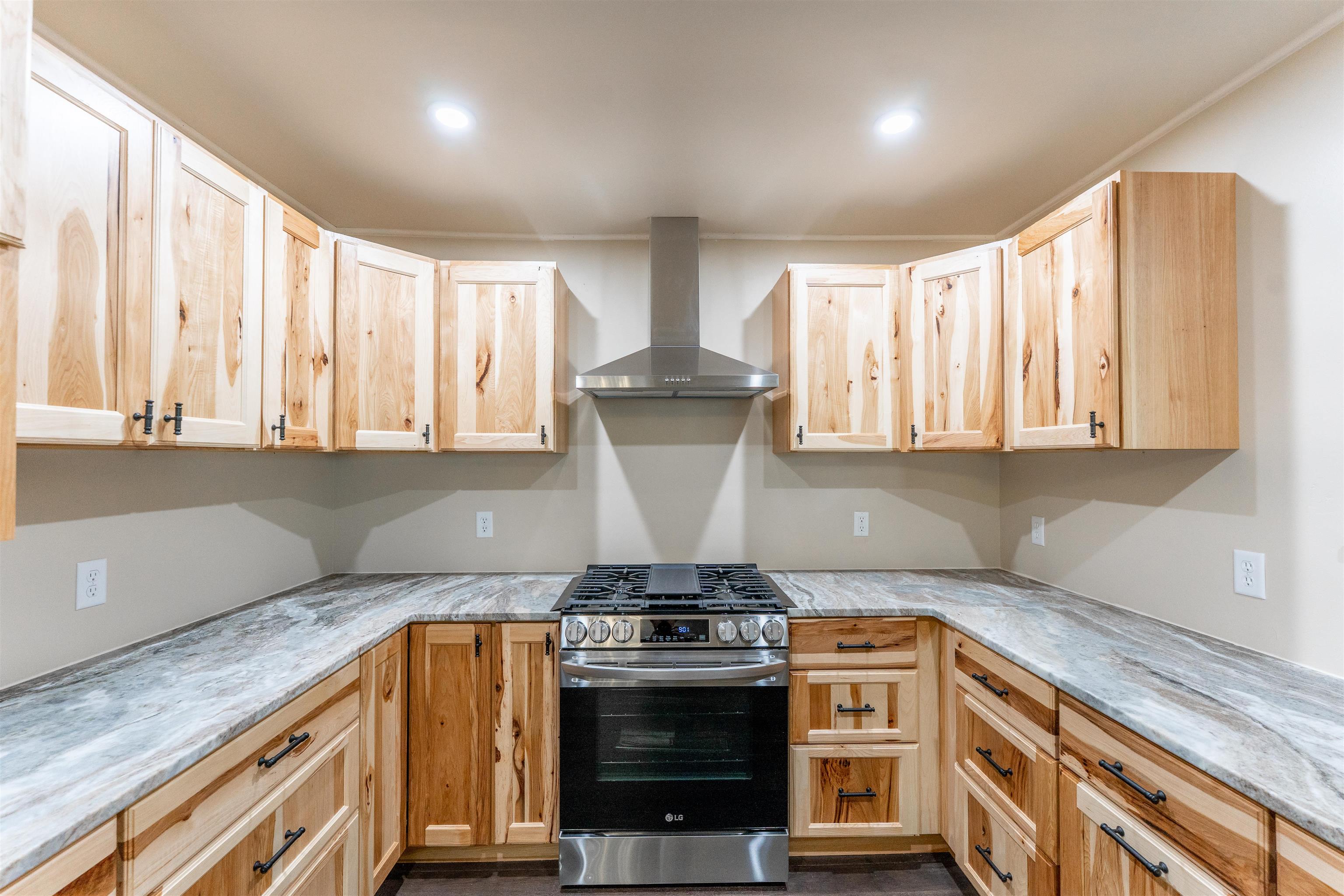 1162 South Bradley Road Oregon, IL 61061 - Photo 21 of 78 a kitchen with stainless steel appliances granite countertop a stove and a sink