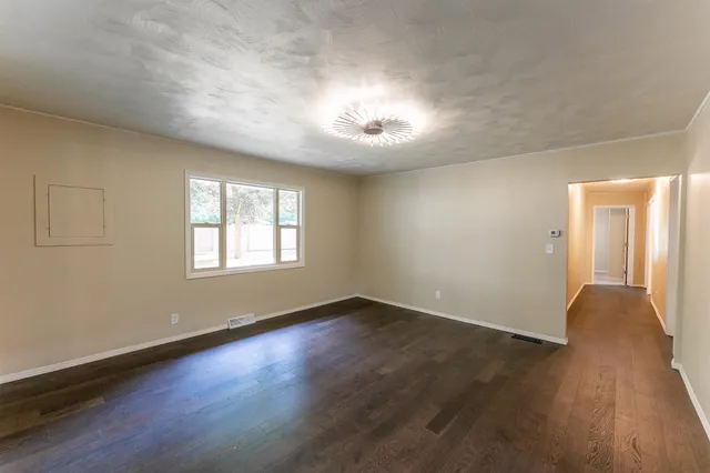a bathroom with a sink a toilet a shower and a mirror