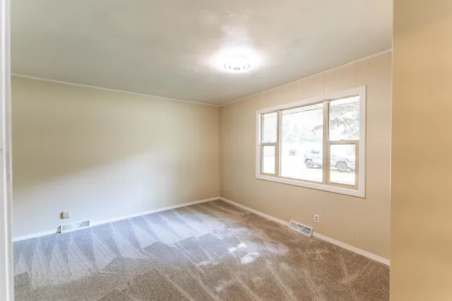 an empty room with a window