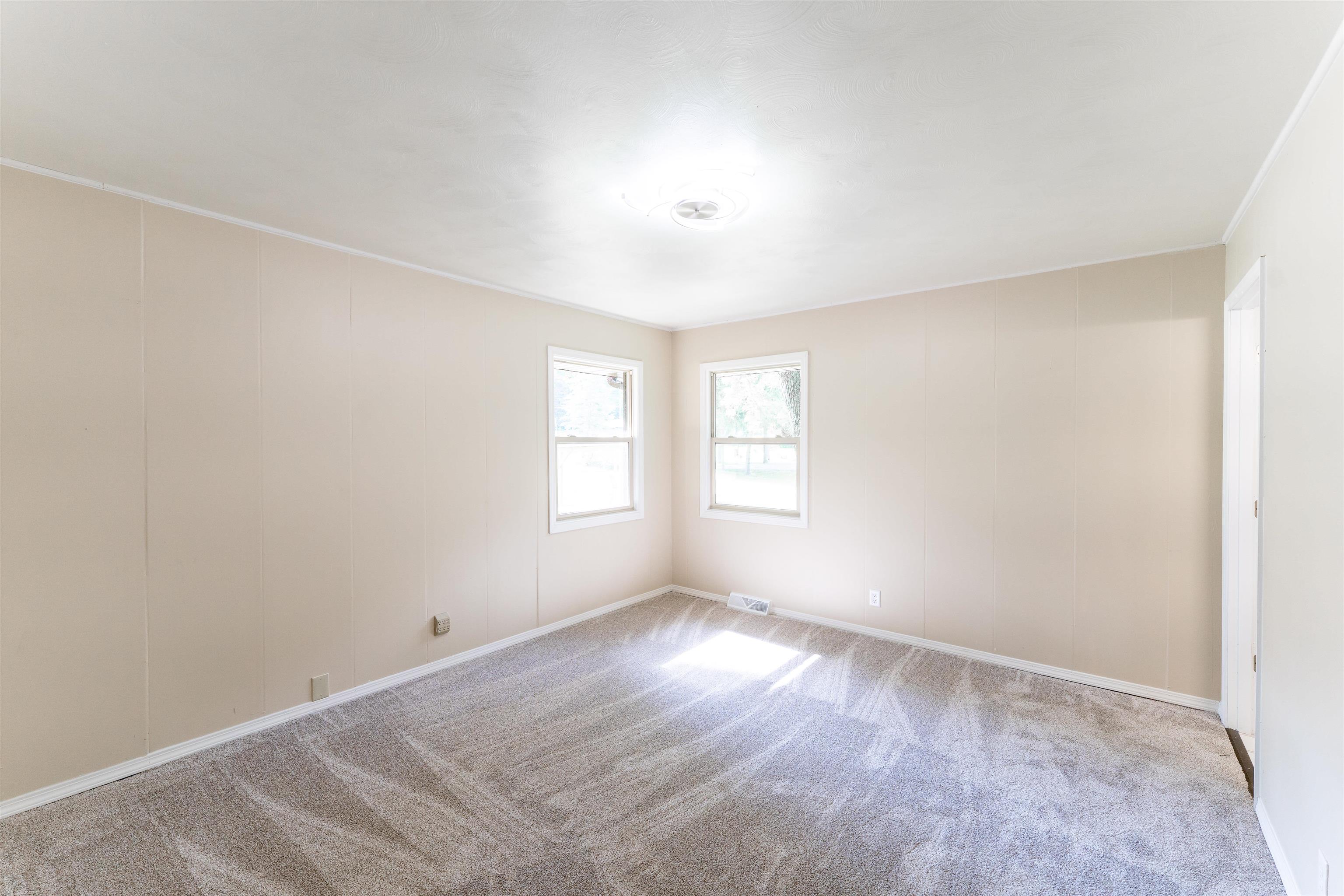 1162 South Bradley Road Oregon, IL 61061 - Photo 31 of 78 an empty room with windows and closet