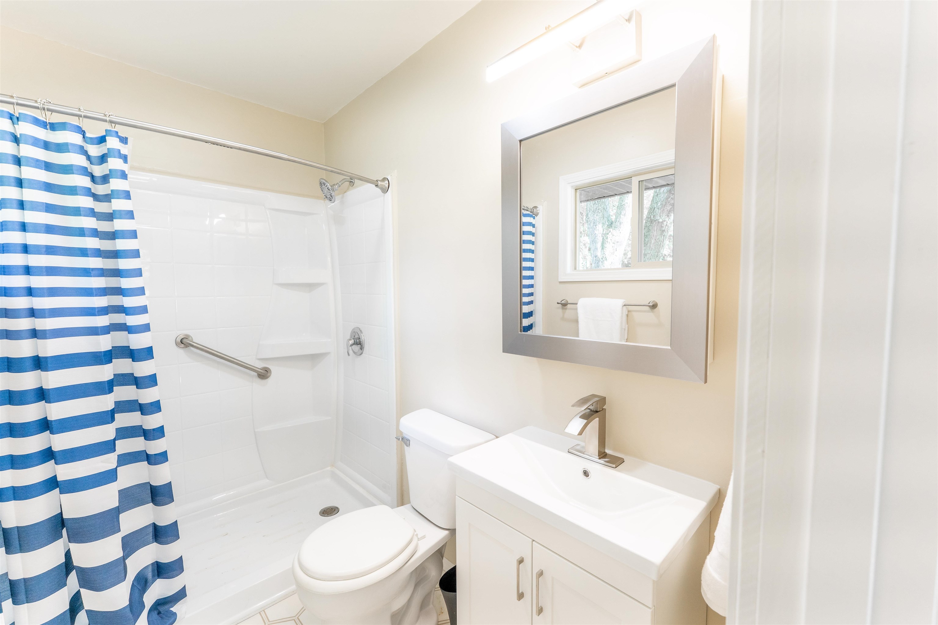 1162 South Bradley Road Oregon, IL 61061 - Photo 34 of 78 a bathroom with a sink a toilet and shower