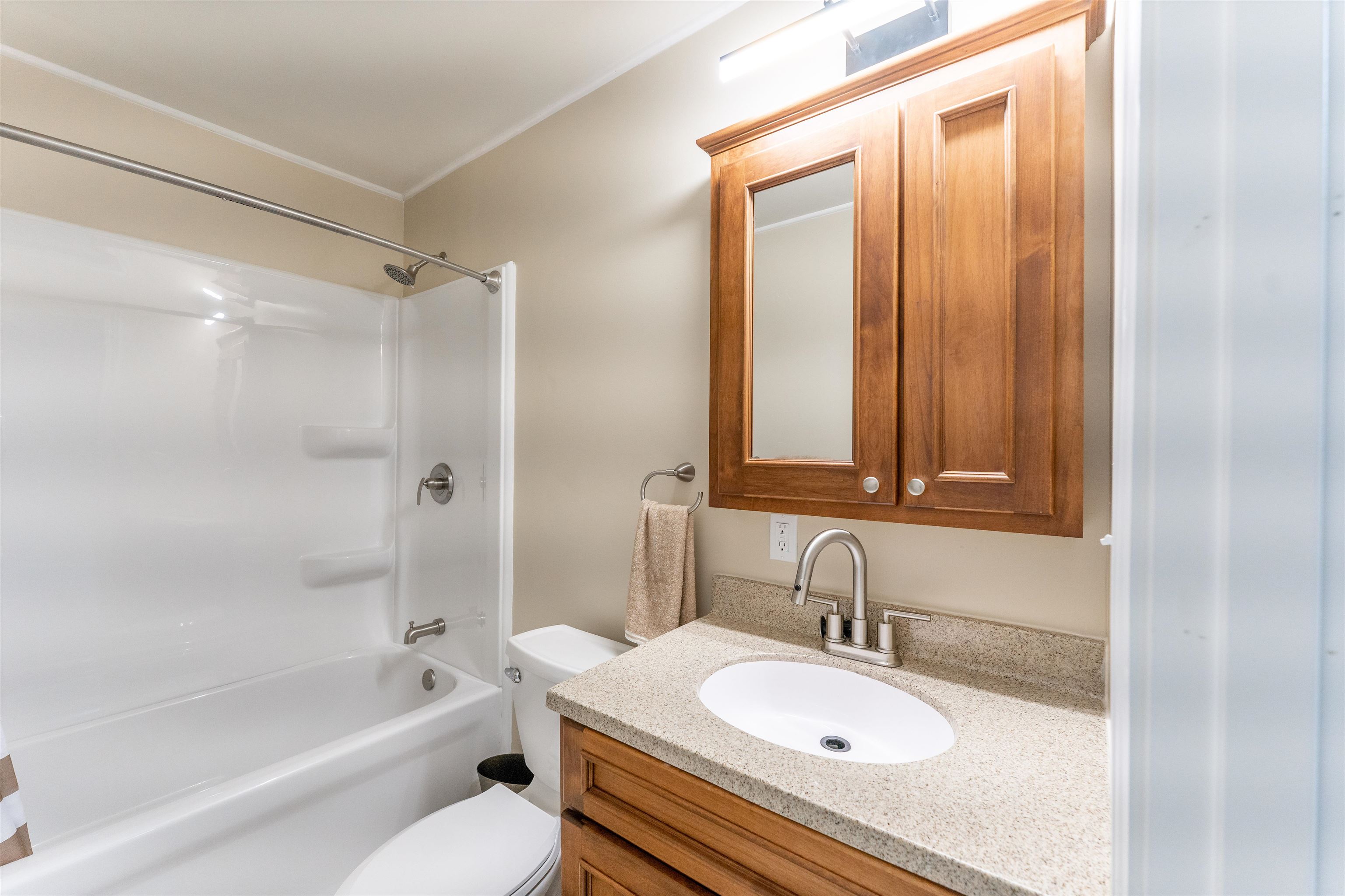 1162 South Bradley Road Oregon, IL 61061 - Photo 39 of 78 a bathroom with a sink a toilet and a bathtub