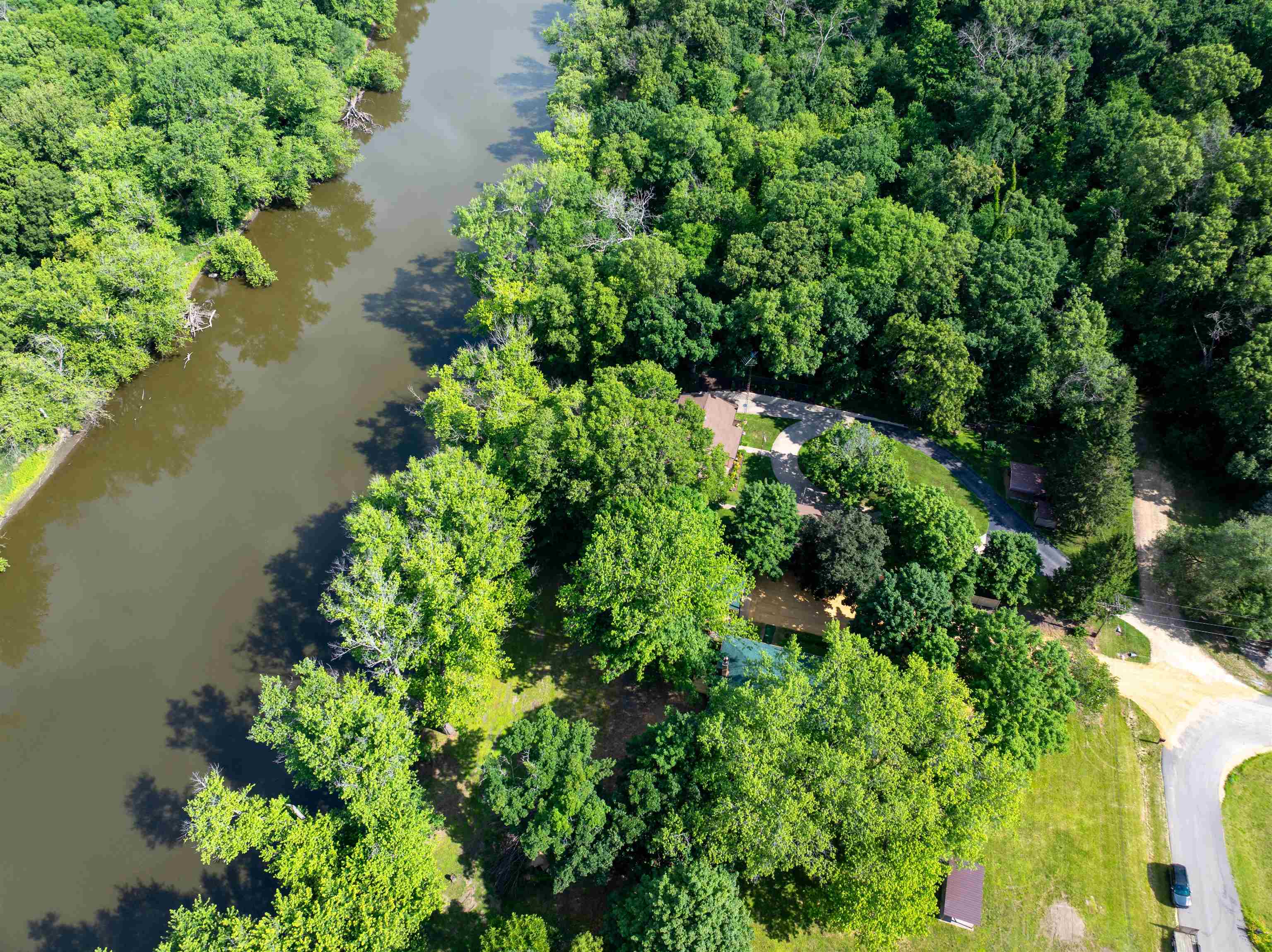 1162 South Bradley Road Oregon, IL 61061 - Photo 4 of 78 an aerial view of a house with a yard and lake view