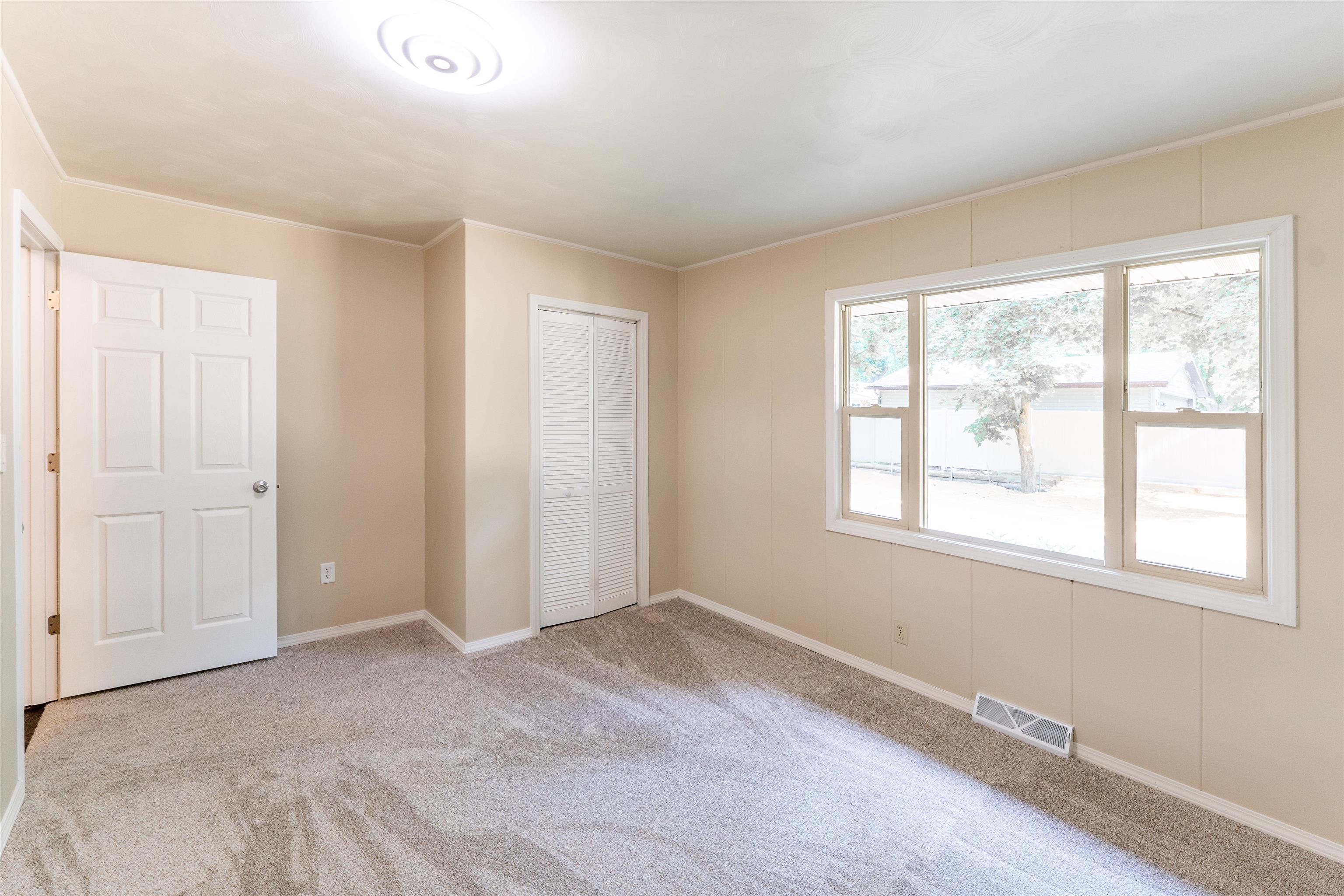 1162 South Bradley Road Oregon, IL 61061 - Photo 41 of 78 a view of an empty room with a window