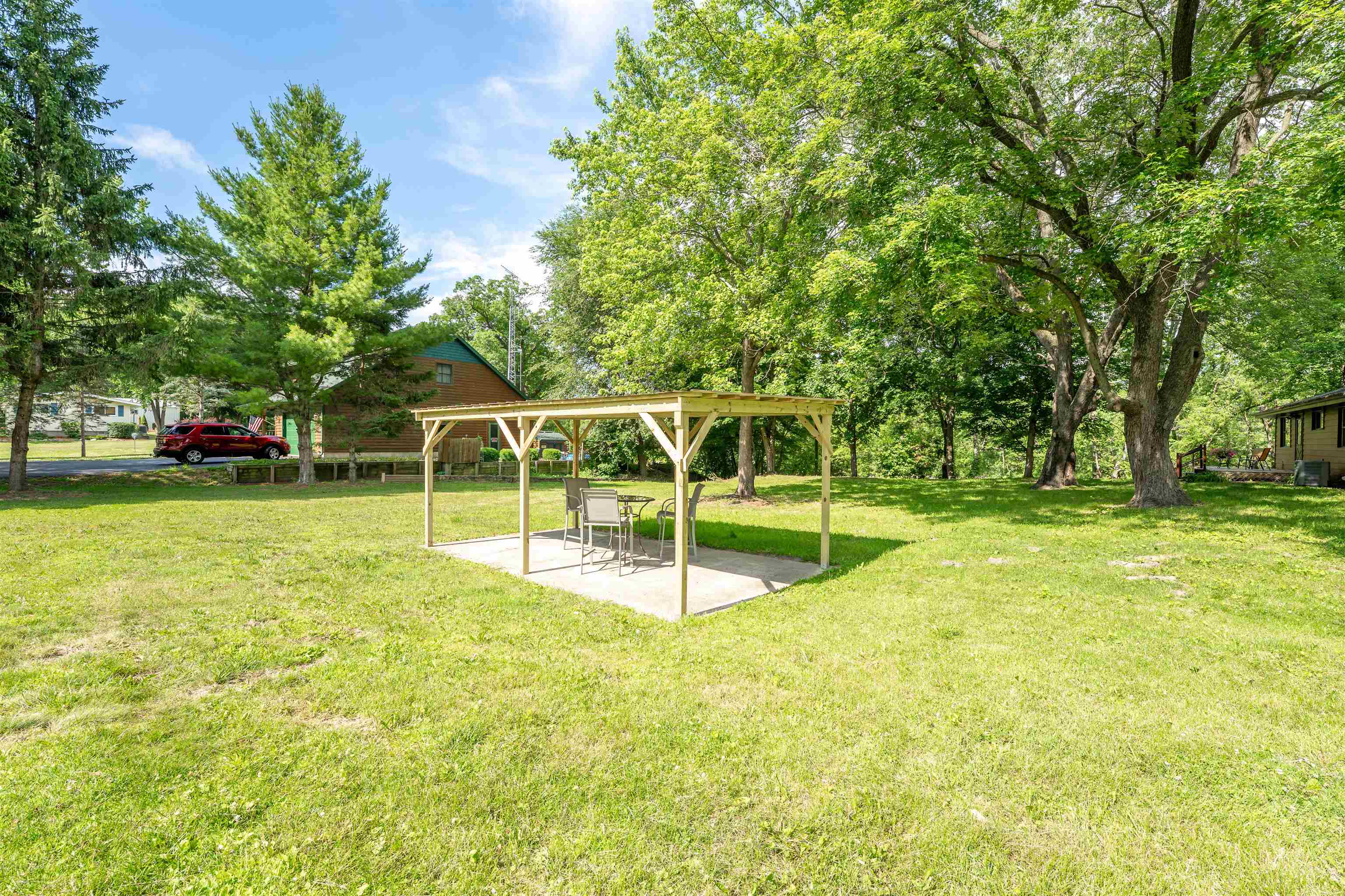 1162 South Bradley Road Oregon, IL 61061 - Photo 45 of 78 a view of a house with a backyard
