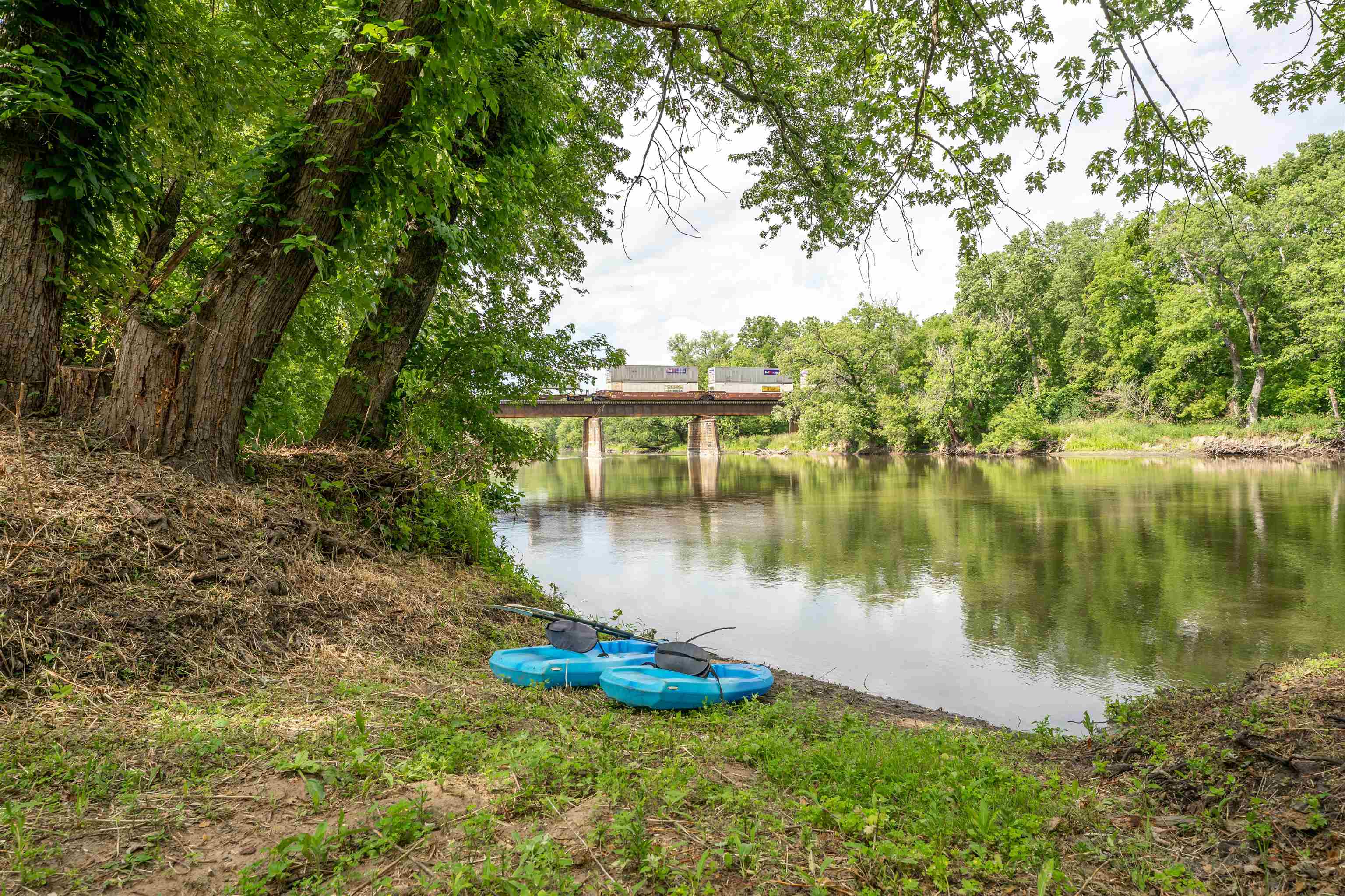 1162 South Bradley Road Oregon, IL 61061 - Photo 55 of 78 a view of a lake in between two large trees