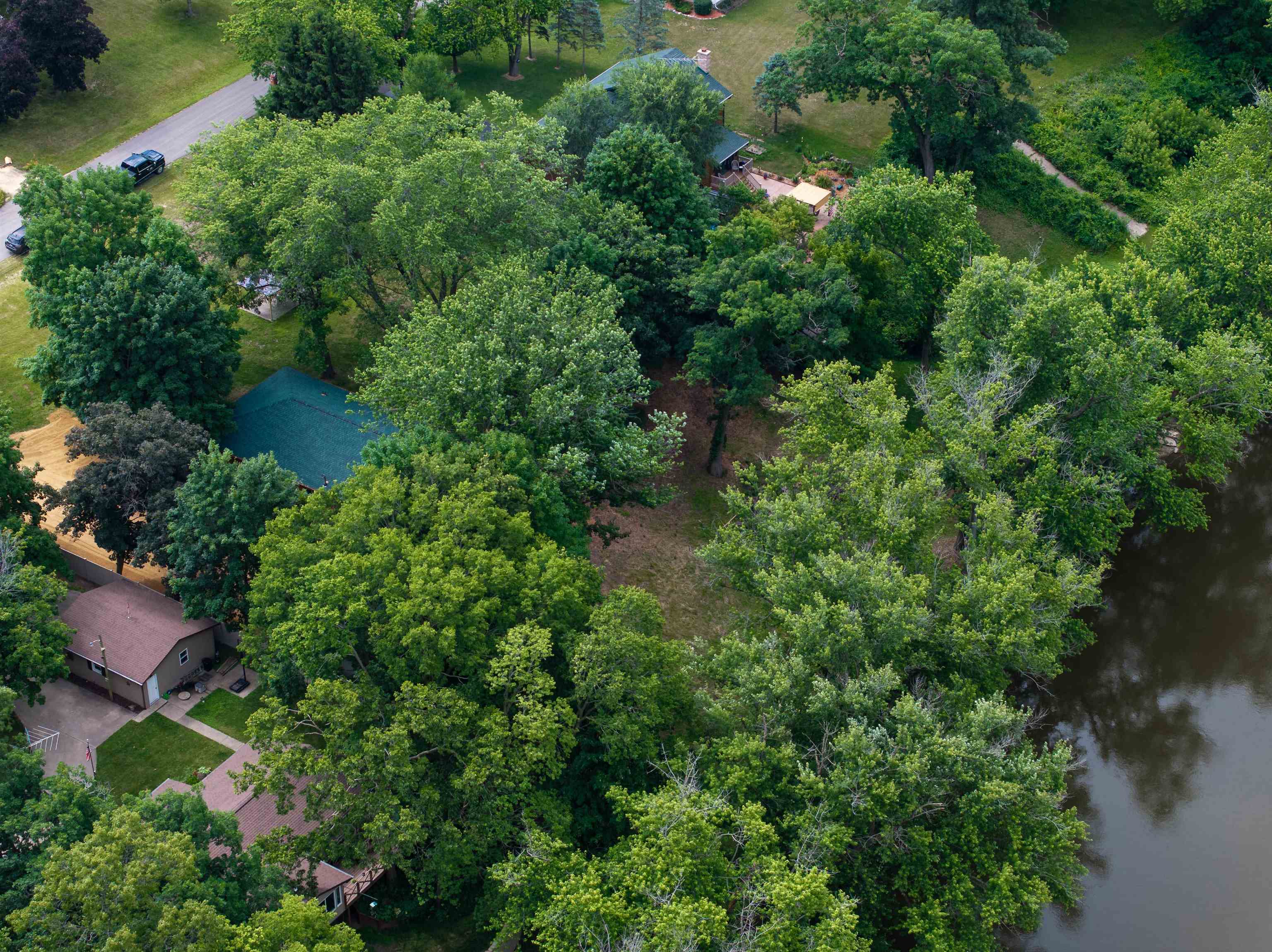 1162 South Bradley Road Oregon, IL 61061 - Photo 68 of 78 an aerial view of a house with pool yard outdoor seating and yard