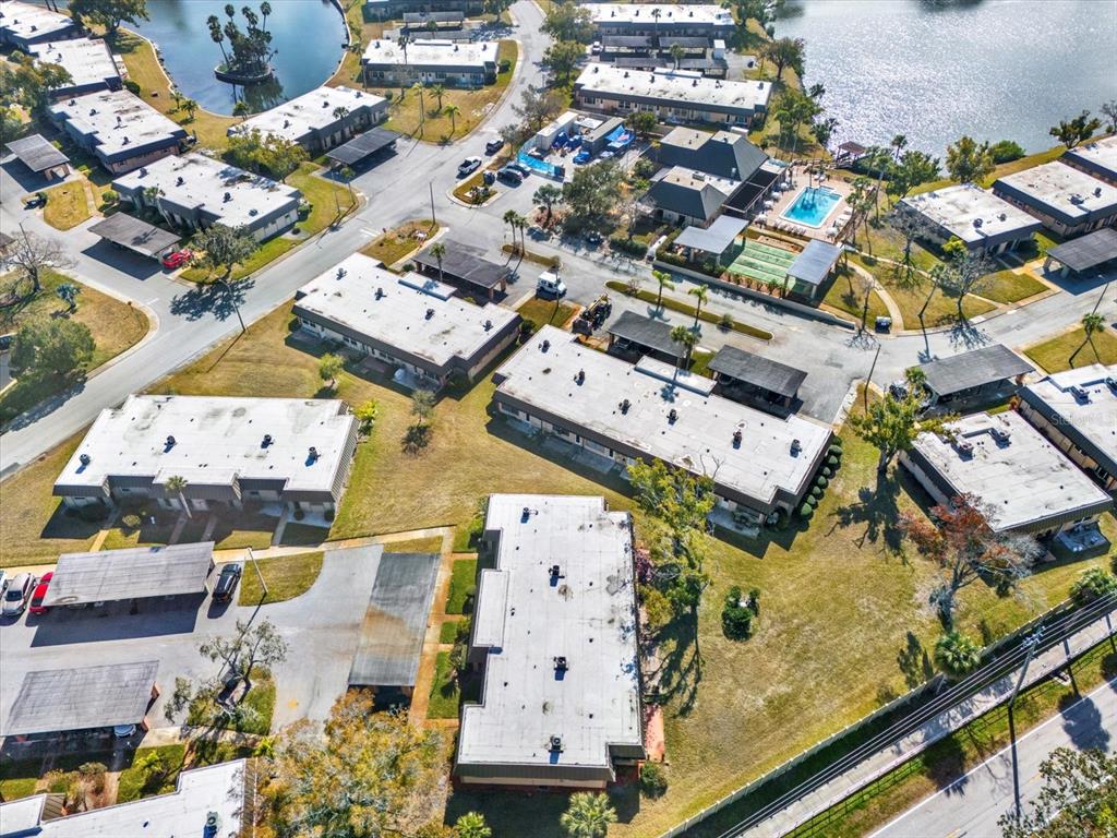 4455 Rustic Drive New Port Richey, FL 34652 - Photo 27 of 27 an aerial view of residential houses with outdoor space