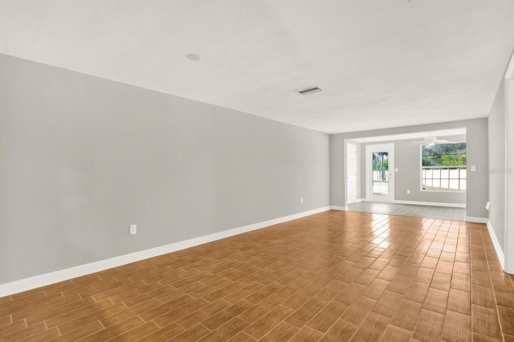 4455 Rustic Drive New Port Richey, FL 34652 - Photo 8 of 27 a view of an empty room with window