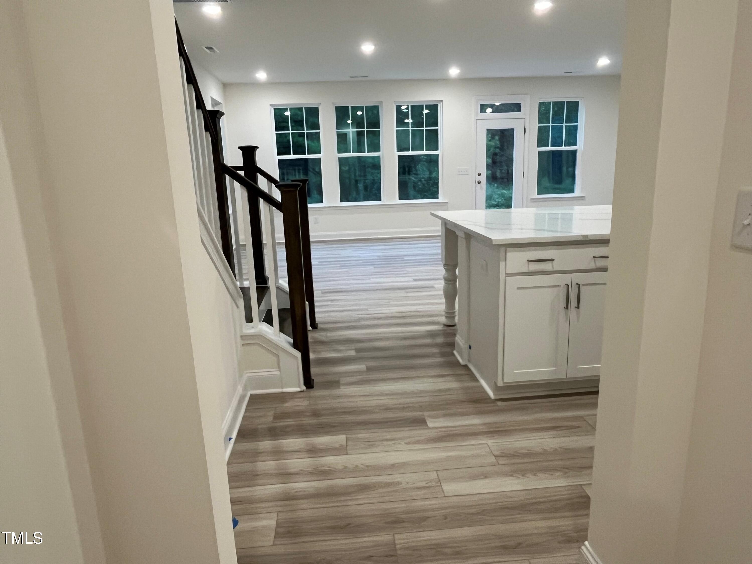5208 Ranger Grv Way Raleigh, NC 27604 - Photo 12 of 59 Foyer leading into Kitchen/Family Room