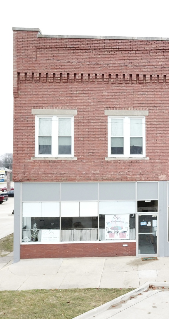 a view of a building with a street