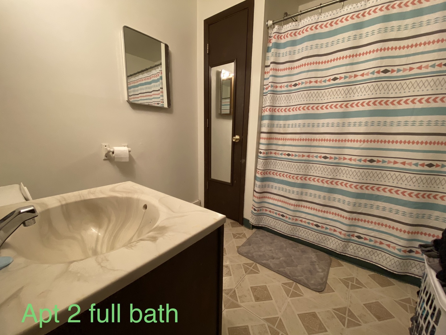 104 South Franklin Street Dwight, IL 60420 - Photo 10 of 18 a bathroom with a sink and a mirror