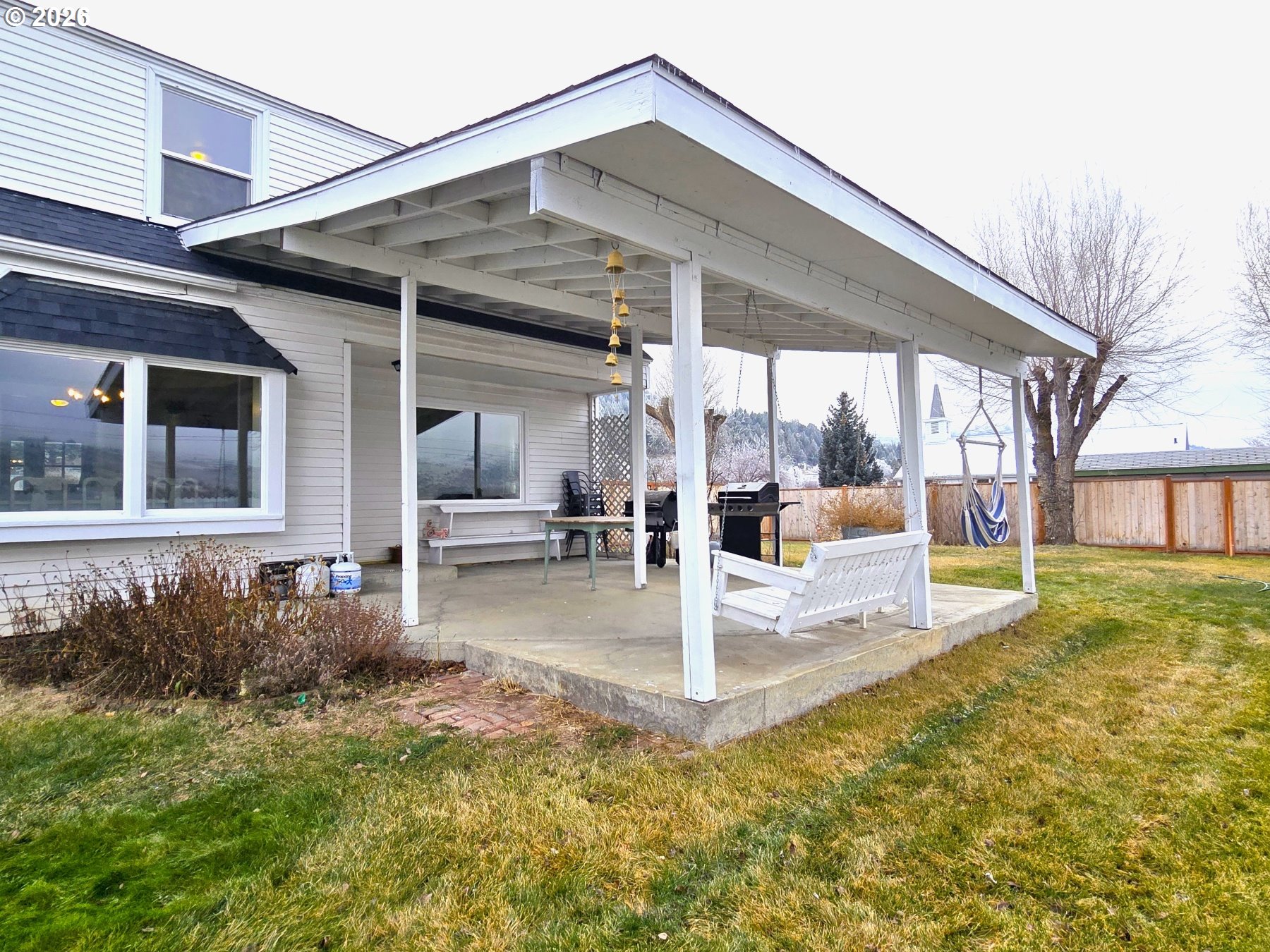 633 Southeast Hillcrest Road John Day, OR 97845 - Photo 11 of 48 a view of a house with backyard and sitting area