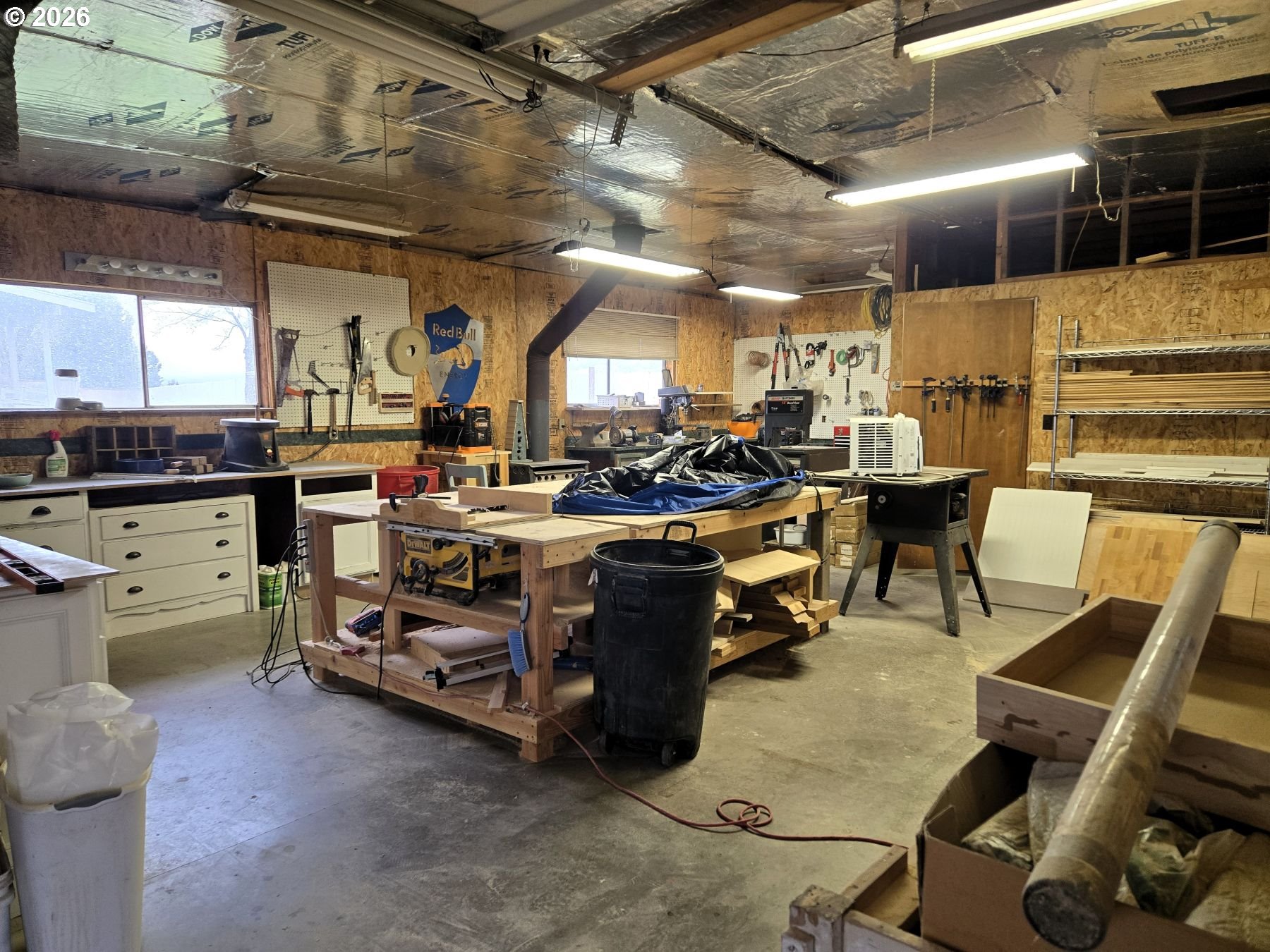 633 Southeast Hillcrest Road John Day, OR 97845 - Photo 21 of 48 a view of a storage room with racks on the wall