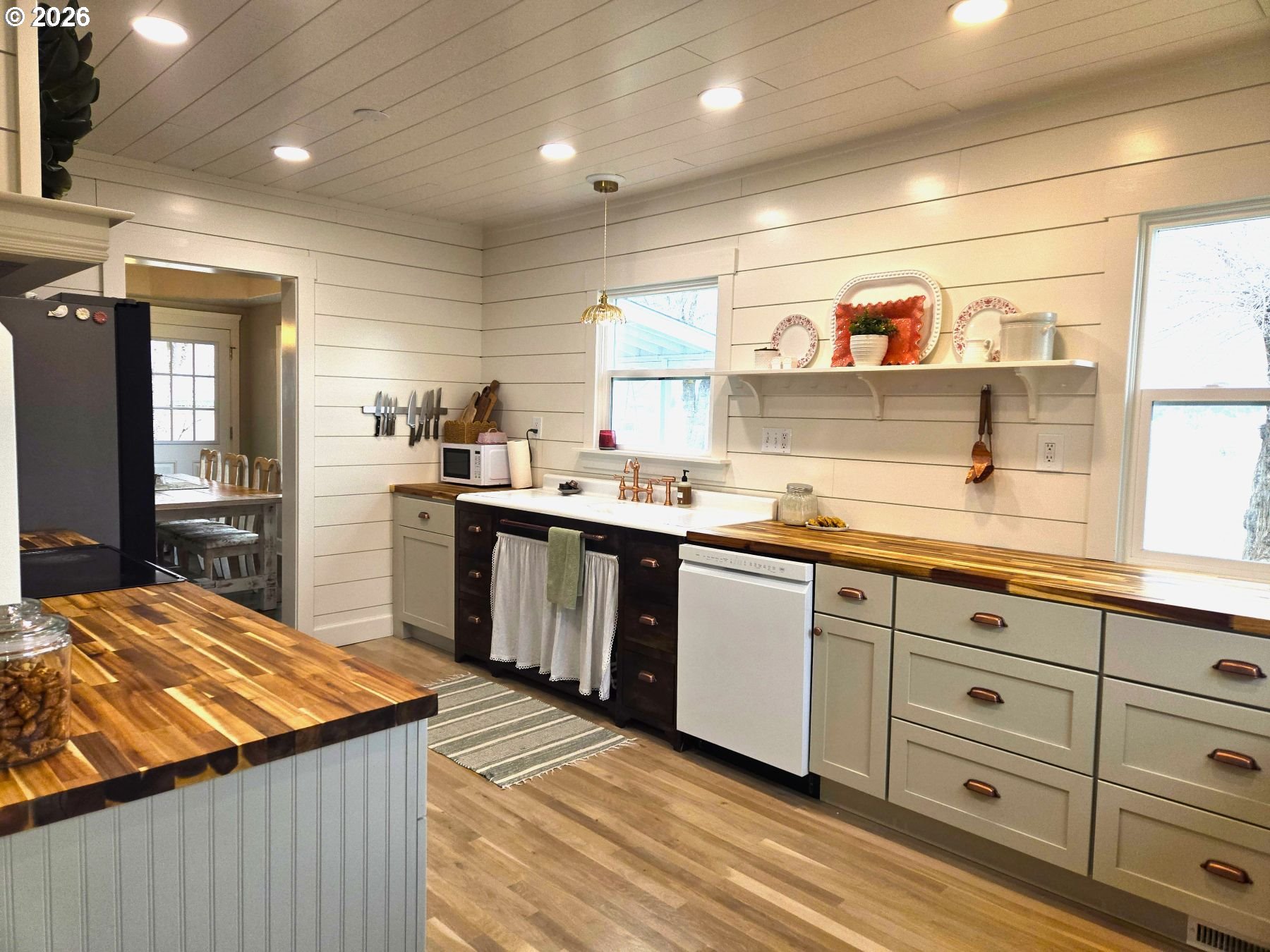633 Southeast Hillcrest Road John Day, OR 97845 - Photo 22 of 48 a kitchen with stainless steel appliances kitchen island granite countertop a sink and cabinets